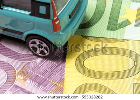 A car and euro bills