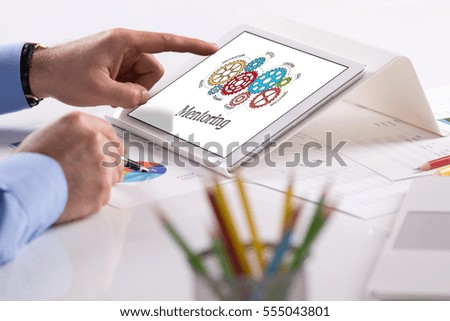Gears and Mentoring Mechanism on Tablet Screen