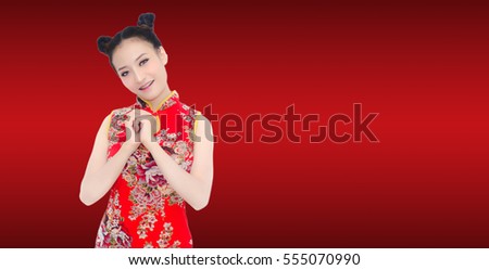 happy Chinese new year. Asian girl with gesture of congratulation  on red background have space word.