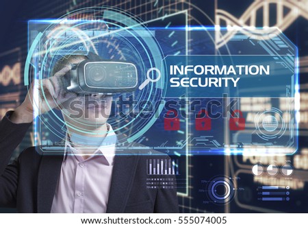 Business, Technology, Internet and network concept. Young businessman working in virtual reality glasses sees the inscription: Information security 