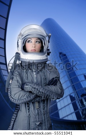 aircraft  astronaut spaceship helmet woman fashion mirror skyscraper blue buildings [Photo Illustration]
