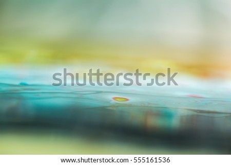 Abstract macro of water surface. Colorful macro abstraction of liquid surface.