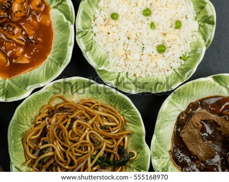 Selection of Chinese Food Egg Fried Rice Sweet and Sour Chicken Noodles and Beef in Black Bean Sauce 