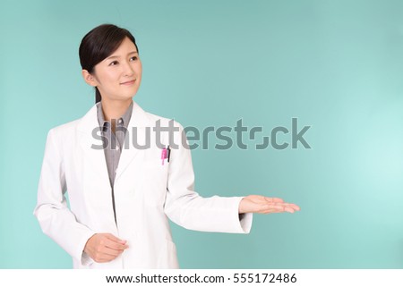 Smiling Asian pharmacist