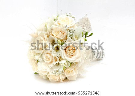 Wedding bouquet made of white roses isolated on a white background Royalty-Free Stock Photo #555271546