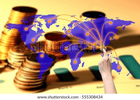 Female hand click for start investment to another country on world map