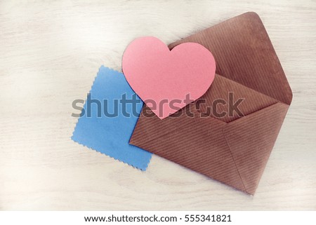 heart symbol and clean form for congratulations in an open envelope / Valentine card retro