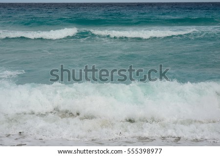 beautiful scene from the coast of Cuba, Varadero - dark-blue horizon of the azure waters of the Atlantic ocean, the blue sky and white clouds, and white sandy beaches