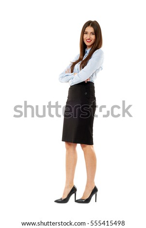 Full length of a confident young business woman isolated on white background