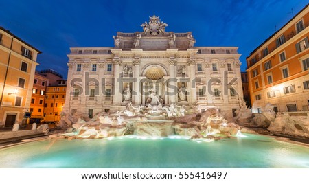 Trevi fountain at sunrise, Rome, Italy. Rome baroque architecture and landmark. Rome Trevi fountain is one of the main attractions of Rome and Italy Royalty-Free Stock Photo #555416497