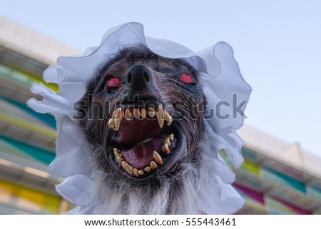 Wolf dressed as grandmother. A masquerade to trick little red riding hood from the fairy tale.