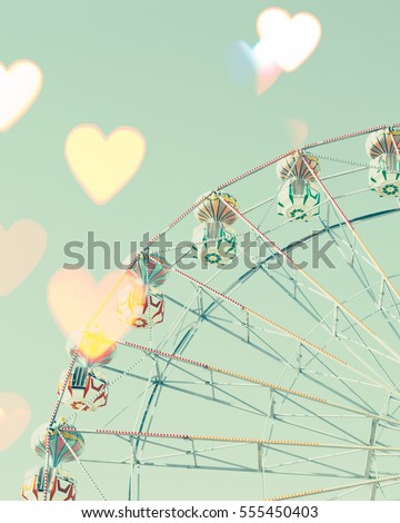VIntage Ferris Wheel with bokeh hearts