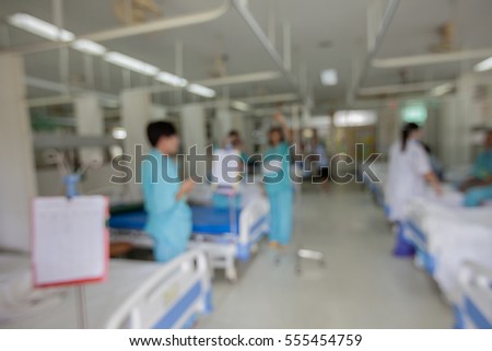 Blurred background sick girl lying in bed in hospital.