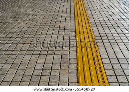 Tactile paving for blind handicap on tiles pathway