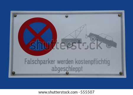 No Parking - Text in English: Cars parking here will be tow away