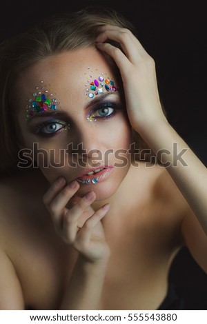 Portrait of beautiful model with bright eyes makeup