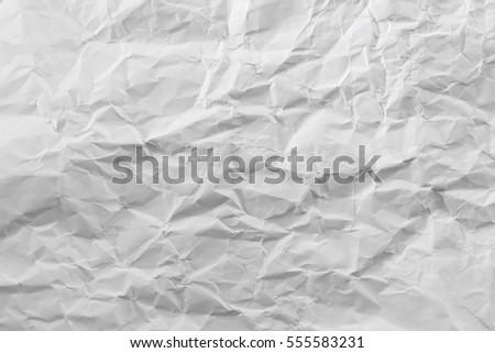 White creased paper background texture. Royalty-Free Stock Photo #555583231