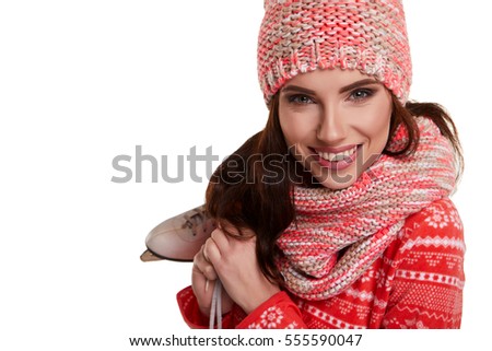 Pretty woman ice skating winter sport activity in white cap smiling facial close-up isolated on a white background