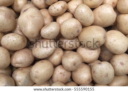 Potatoes at the market Royalty-Free Stock Photo #555590155