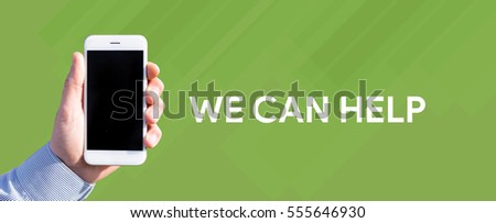 Smart phone in hand front of green background and written WE CAN HELP