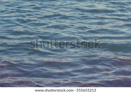 Blue water ripples texture with dark and light area