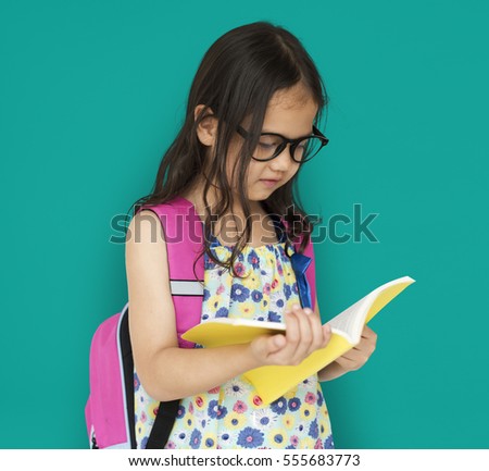 Little Girl Reading Book Focusing
