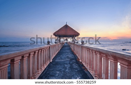 Long jetty during sunrise.