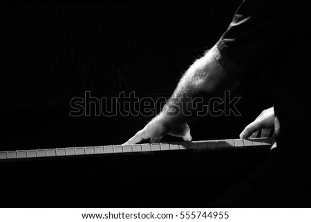 Pianist Royalty-Free Stock Photo #555744955