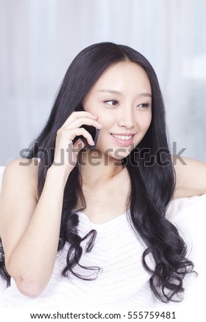 	Young woman on the phone	