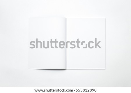 Blank open magazine isolated on white background
