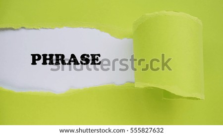 PHRASE ! text written on a green pieces of torn paper. Suitable for motivational quotes.           
