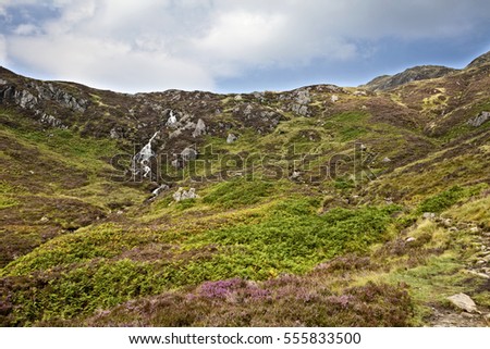 Magnificent panorama of mountains Loch Lomond & The Trossachs National Park climbing the mountain of Ben Venue in the Highlands of Scotland, UK