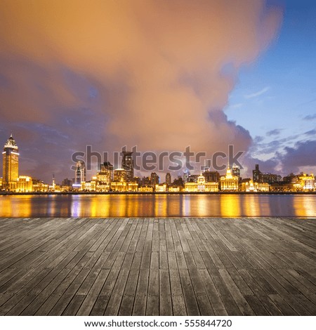 beautiful shanghai bund with sunset glow, wooden floor as a prospect