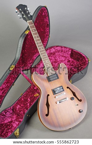 Electric guitar and guitar case.