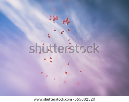 Countless red love balloos flying to heaven against sky background. Heart shaped balloons on blue sky for wedding cards concept, bridal blogs and magazines, lens flare, image with retro filter effect