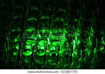 Roof full of green beer bottles in Amsterdam, Netherlands Royalty-Free Stock Photo #555887770