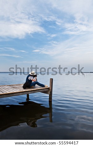 The photographer  working on the lake