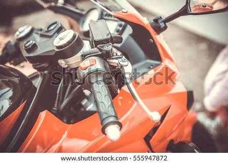 Part of red sport motorcycle. Toned, style glamour photo. 