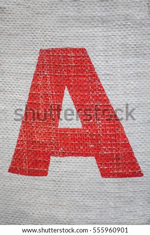 Red Letter A printed on a sack