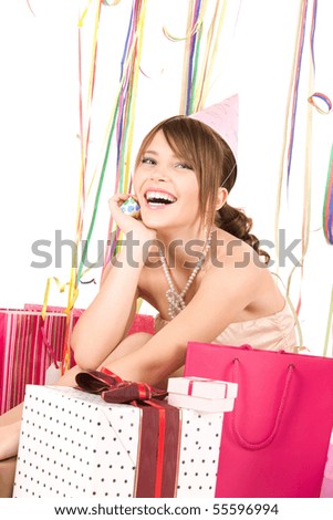 picture of happy teenage party girl with gifts