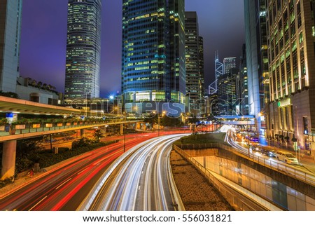 Hong kong city Car light trails and urban landscape night traffic modern buiding in Hong Kongt