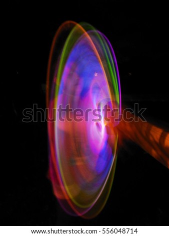 Spinning light motion
