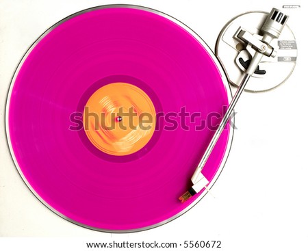pink vinyl turning on turntable Royalty-Free Stock Photo #5560672