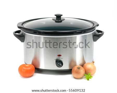 An electric slow cooker on a kitchen bench Royalty-Free Stock Photo #55609132