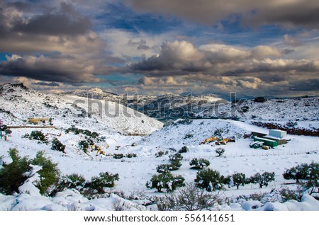 Winter landscape with snow, clouds and sunset, Neapoli, Crete