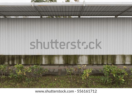  Large blank billboard on a street wall,  banners with room to add your own text