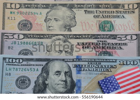 Dollar banknote and coin with USA flag