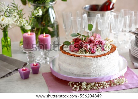 Delicious wedding cake on beautifully served table