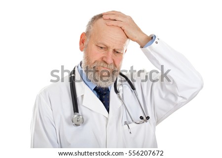 Picture of a confident doctor having a headache