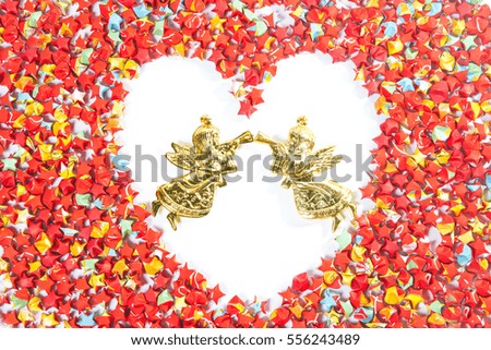 red star paper heart shape on white background with angel of valentine